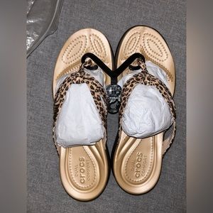 Brand new Croc sandals, never worn, tags still on.